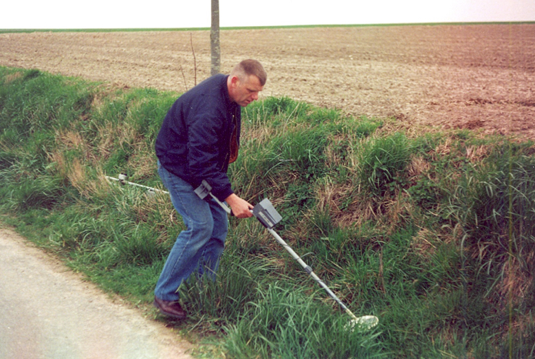 Melvin searches along the side of the road